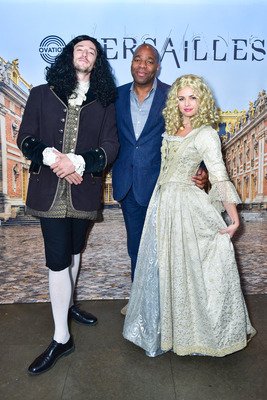 Jon at Versailles with costumed performers